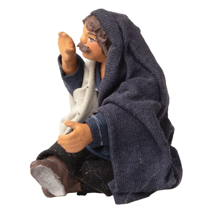 Seated vendor calling out with hand to mouth series 10 cm