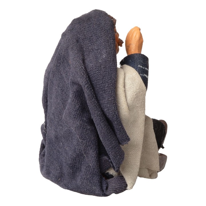 Vendedor sentado que llama con la mano a la boca serie 10 cm