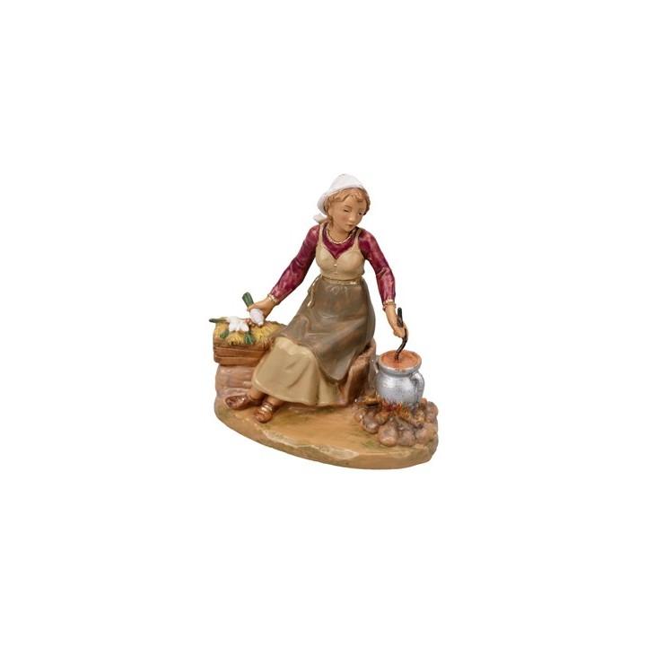 Donna seduta che cucina serie 12 cm Fontanini