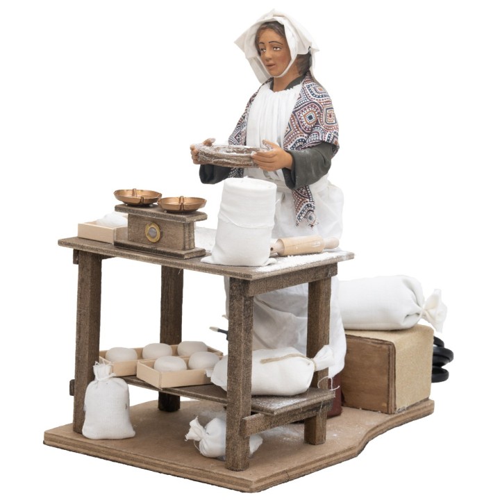 Donna che setaccia serie 30 cm in movimento