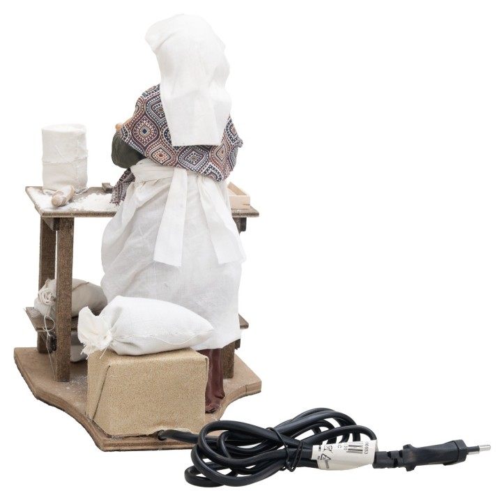 Donna che setaccia serie 30 cm in movimento