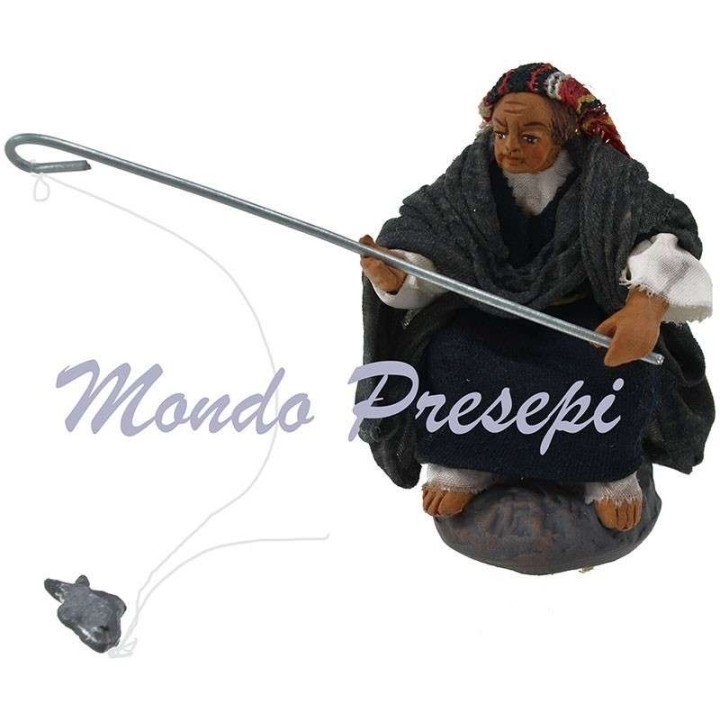 Cm 9 Uomo seduto che pesca