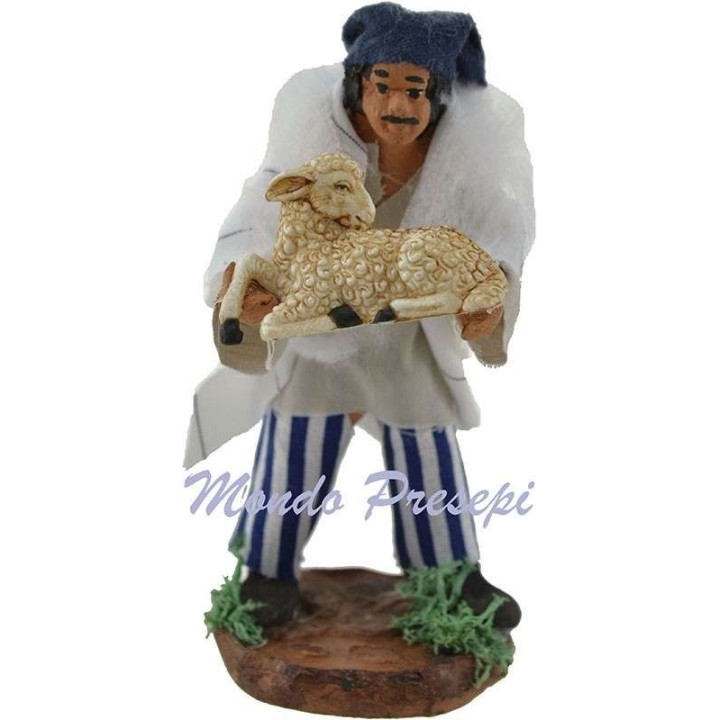 Man with sheep in arm cm 10